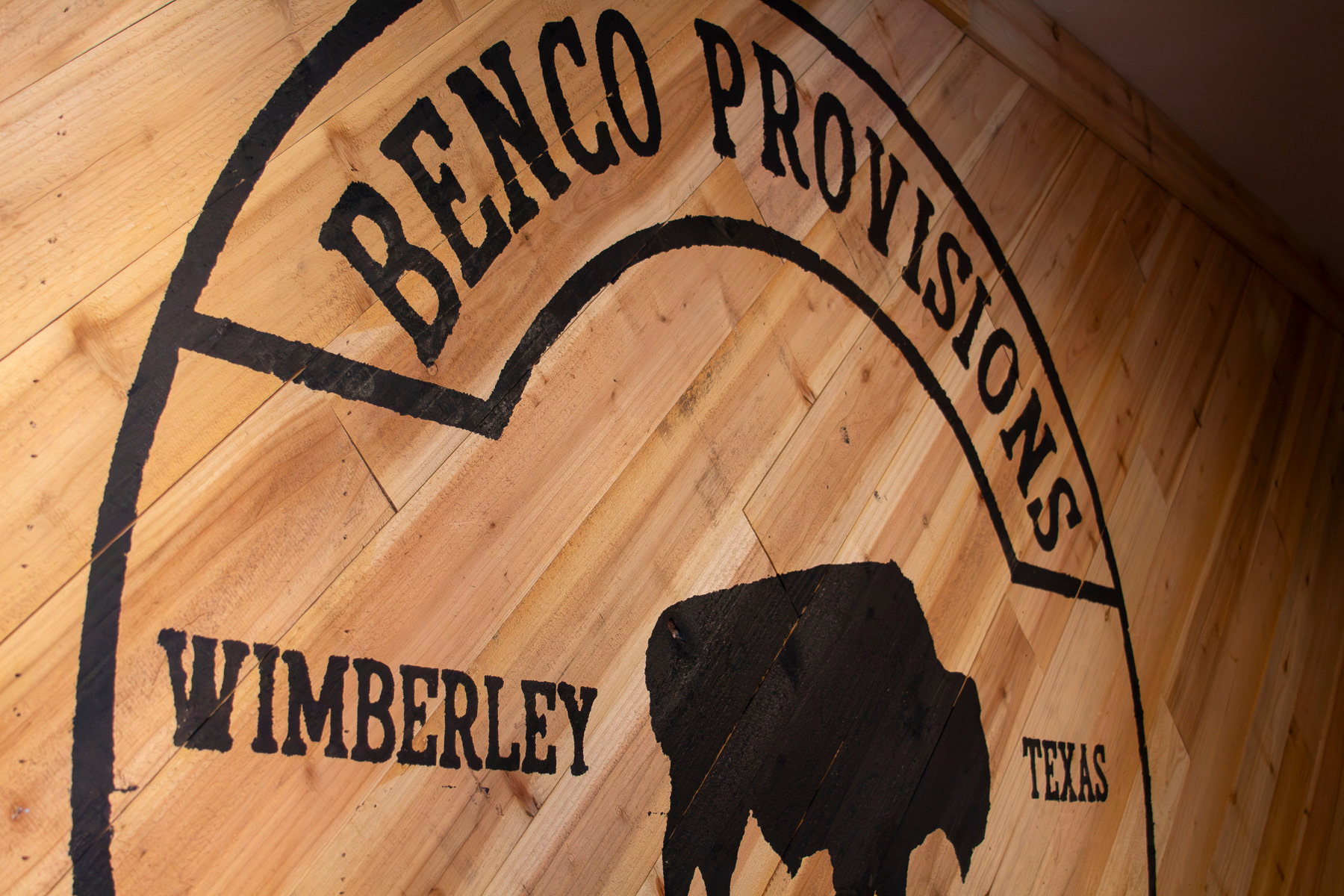Benco Provisions sign painted on the wood wall